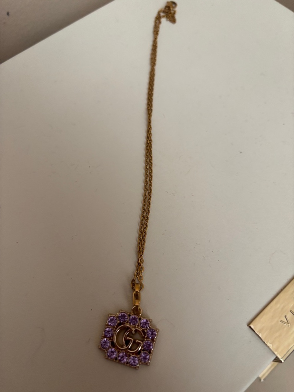 Gucci Gold Necklace with Purple Crystal GG Pendant